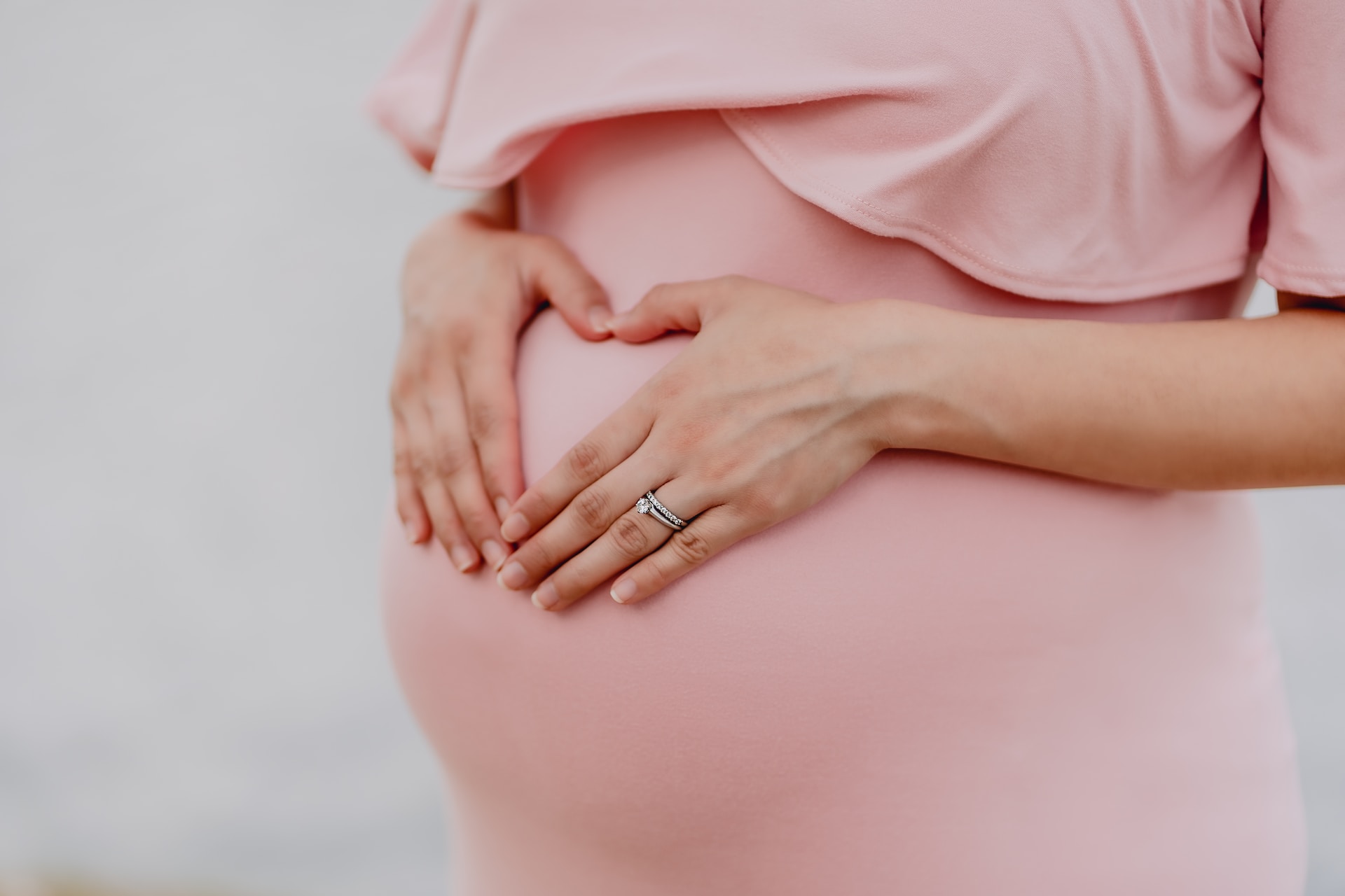 close into a pregnant's woman belly with happy mother's day wishes