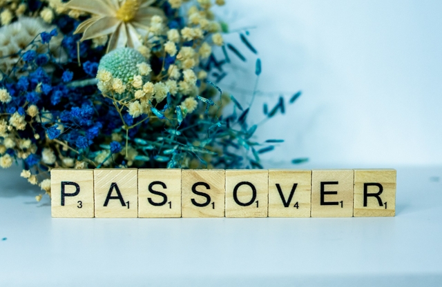 passover written in wood tile words for a happy pessach greeting