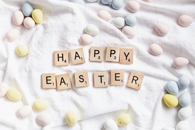 happy easter message in word tiles in a bed sheet