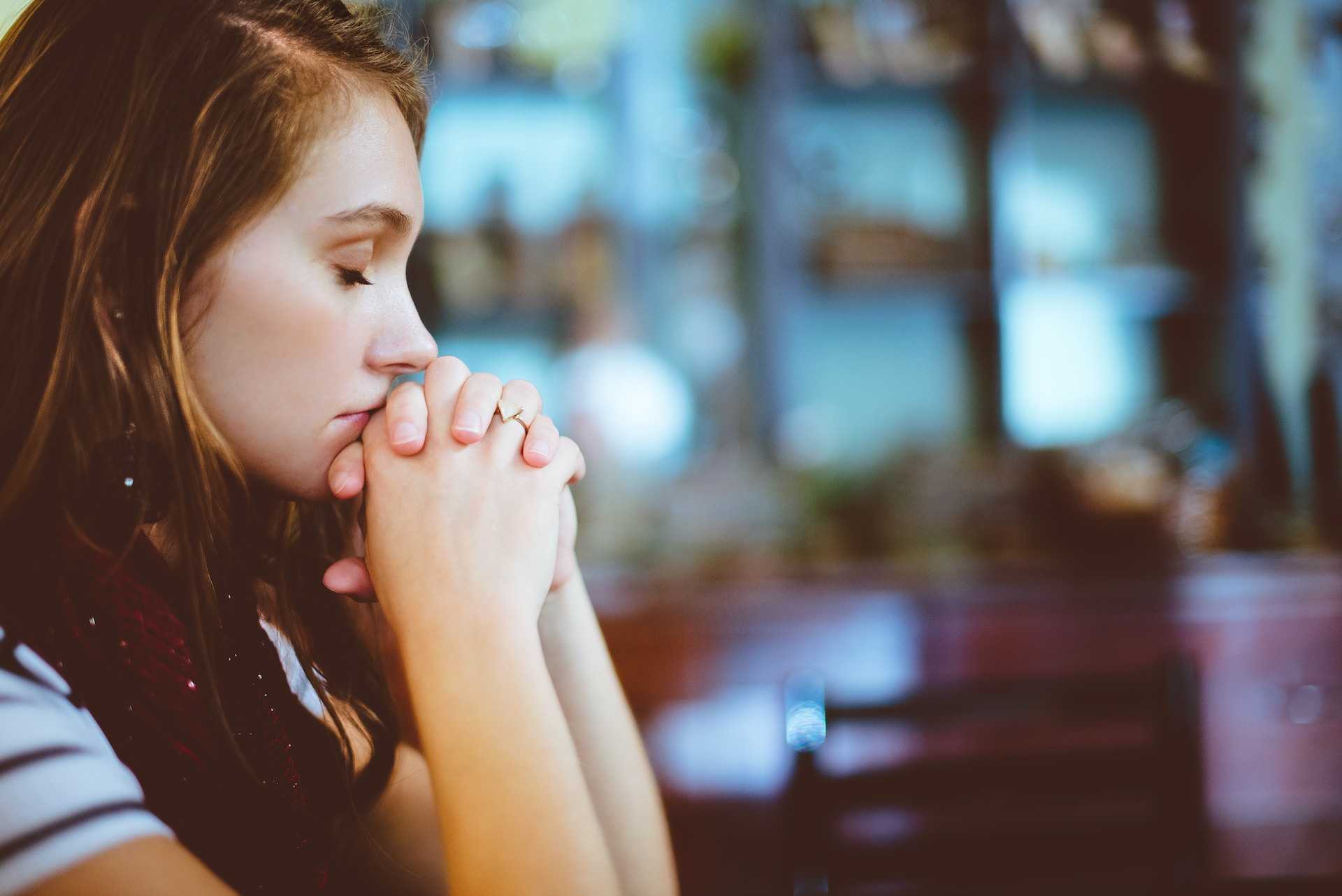 woman starting her day praying and receiving good morning wife messages