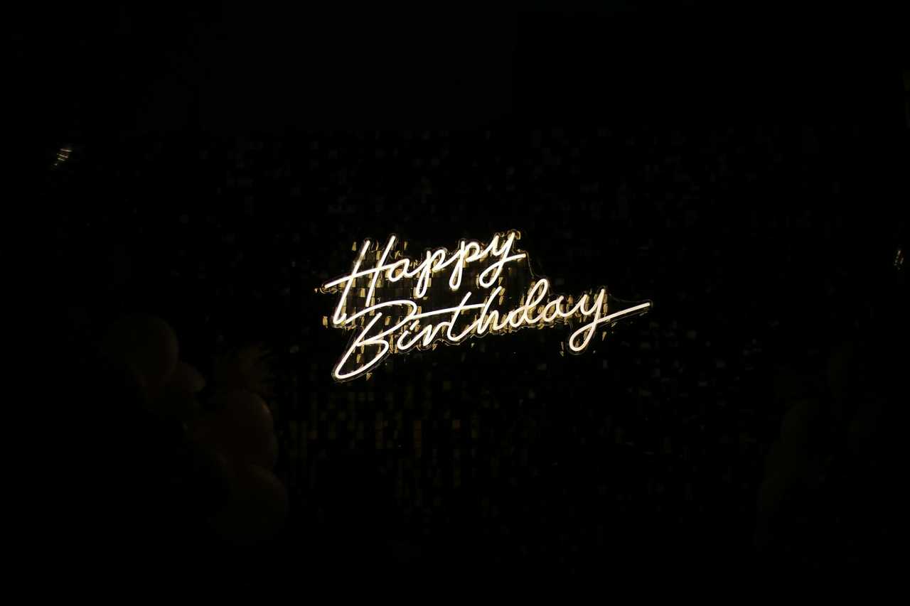 happy birthday message written in neon letters for brother