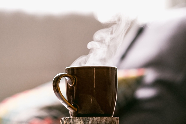 cup of hot coffee releasing steam in a fresh morning after a good morning my love message